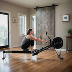 Concept2 RowErg rowing machine being used at home for full body cardio workout