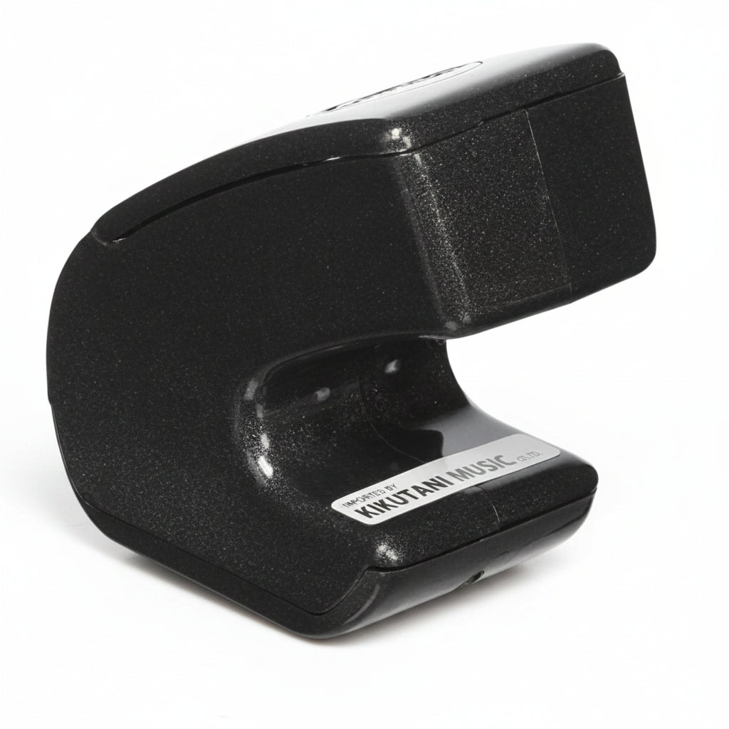Ebow Plus guitar sustainer side profile showing compact handheld electronic bow design