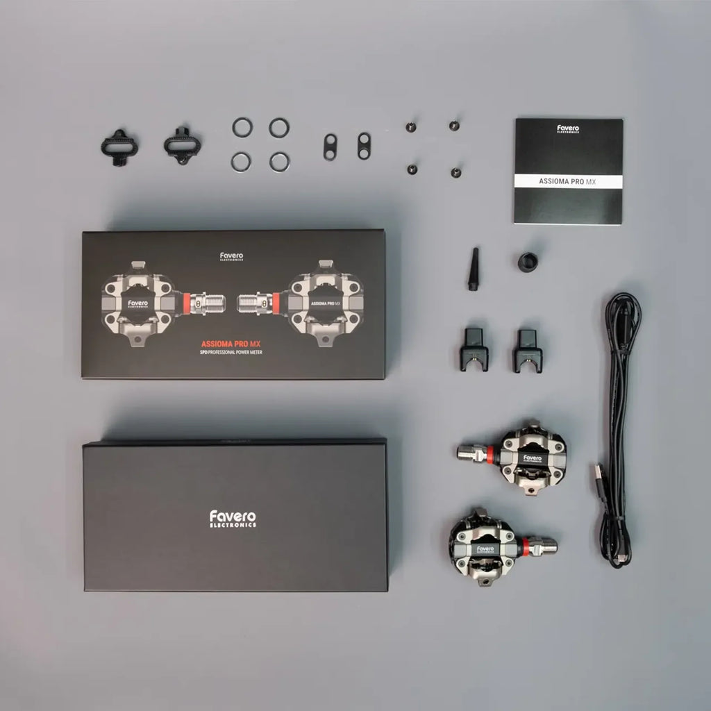 Favero Assioma PRO MX-1 kit contents including pedals charger washers cleats and accessories