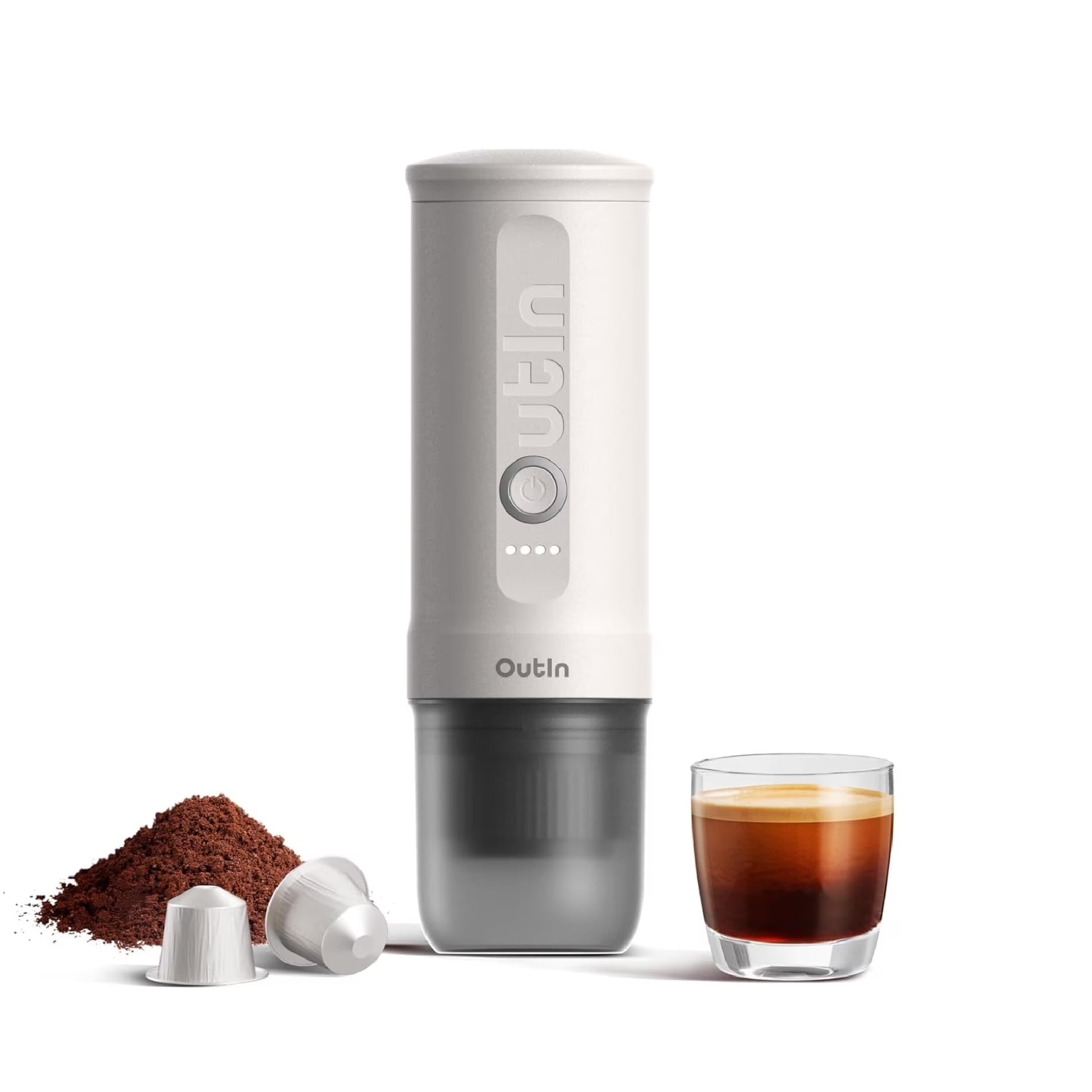 OutIn Nano portable espresso maker with espresso cup, capsules, and ground coffee setup