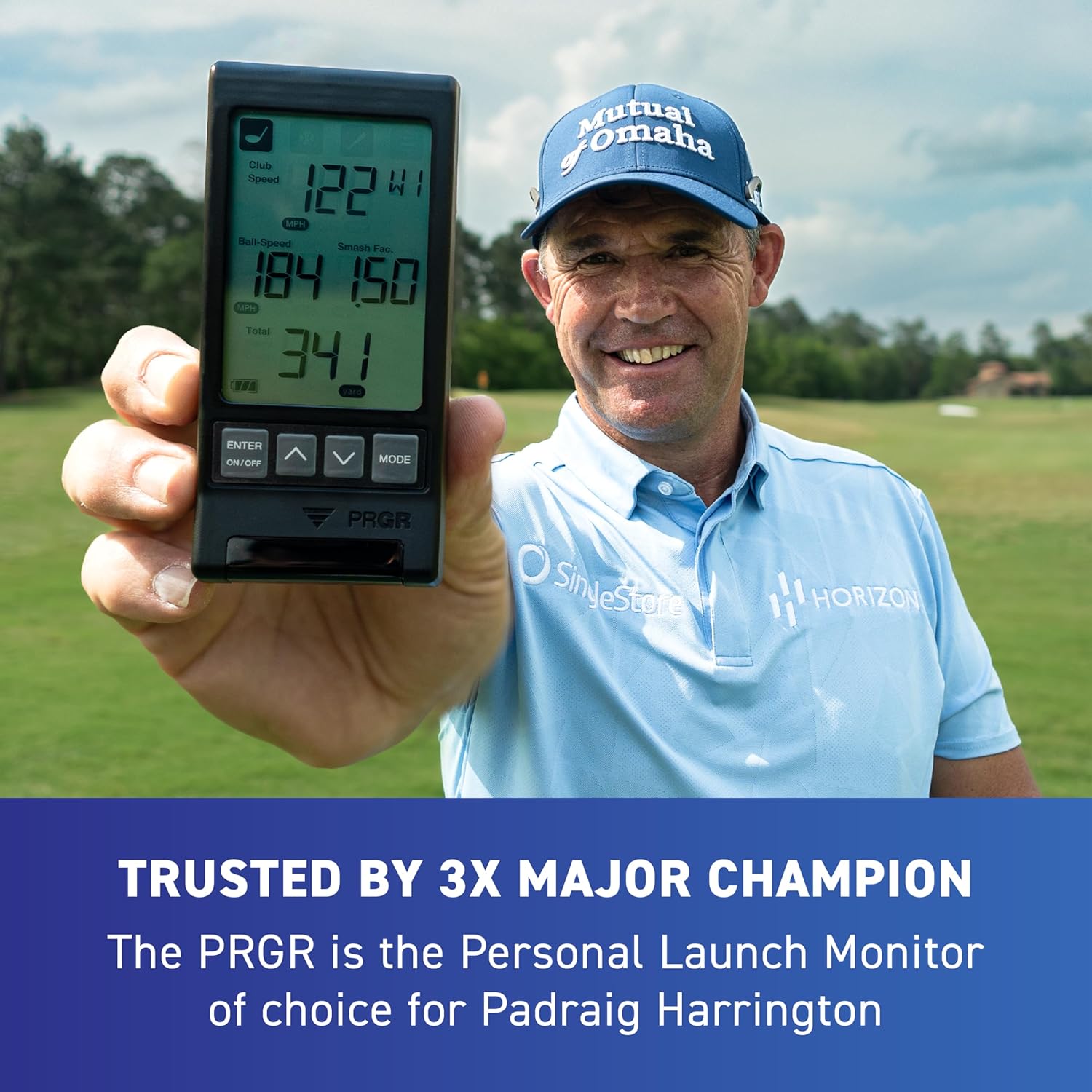 Professional golfer holding PRGR portable launch monitor on golf course for swing tracking and distance analysis
