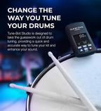 Tune-Bot Studio drum tuner placed on drum helping musicians tune drums quickly and accurately