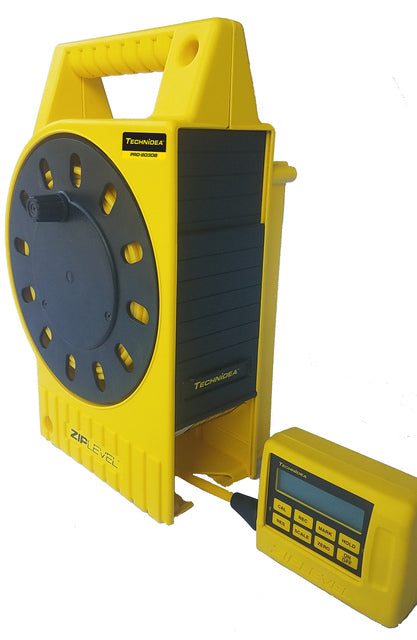 ZipLevel PRO-2000B handheld module and base unit on construction site showing elevation reading.
