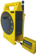 ZipLevel PRO-2030 handheld unit and base set up on an outdoor construction site with cord extended.