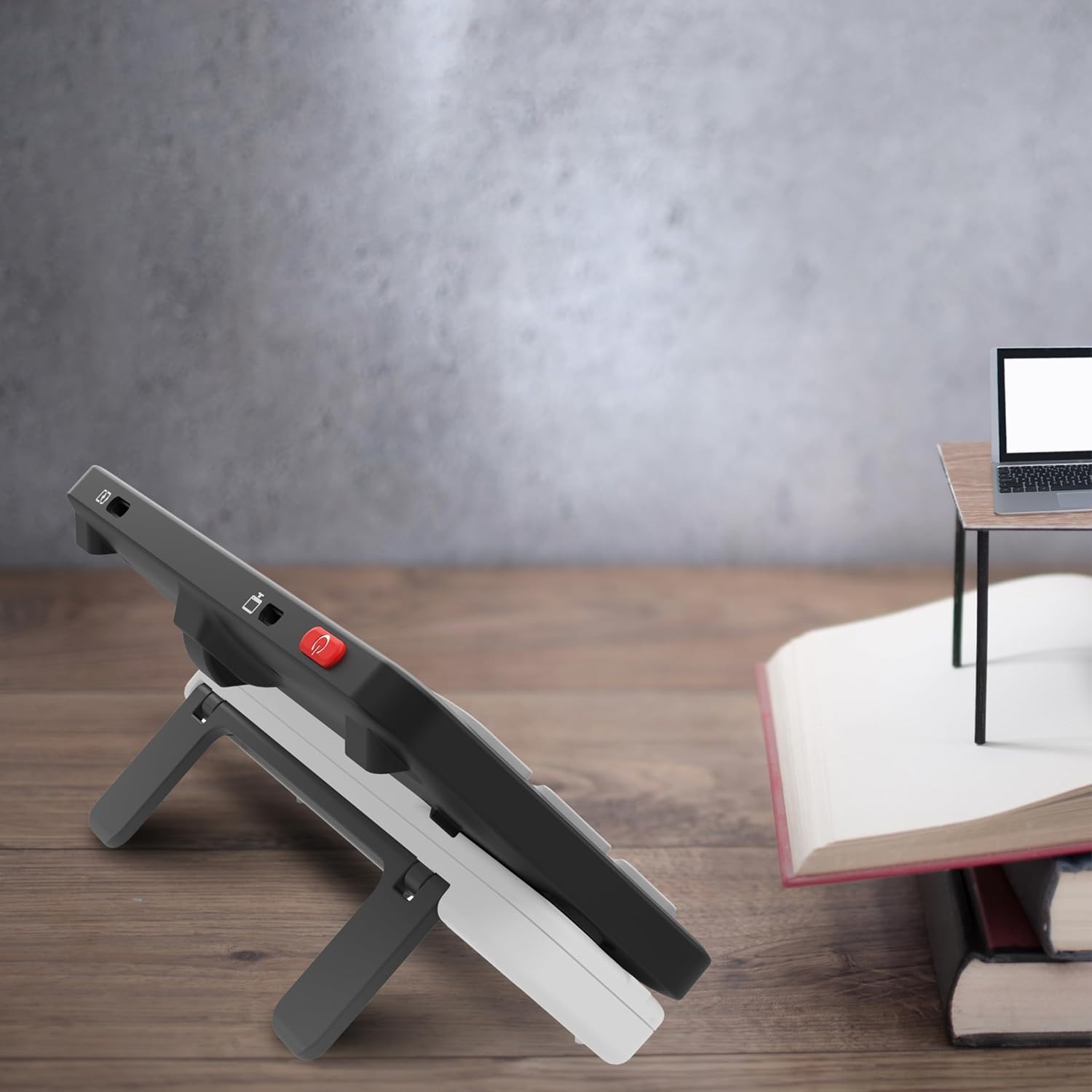 Zoomax Luna 6 video magnifier placed on desk with adjustable stand for hands free reading